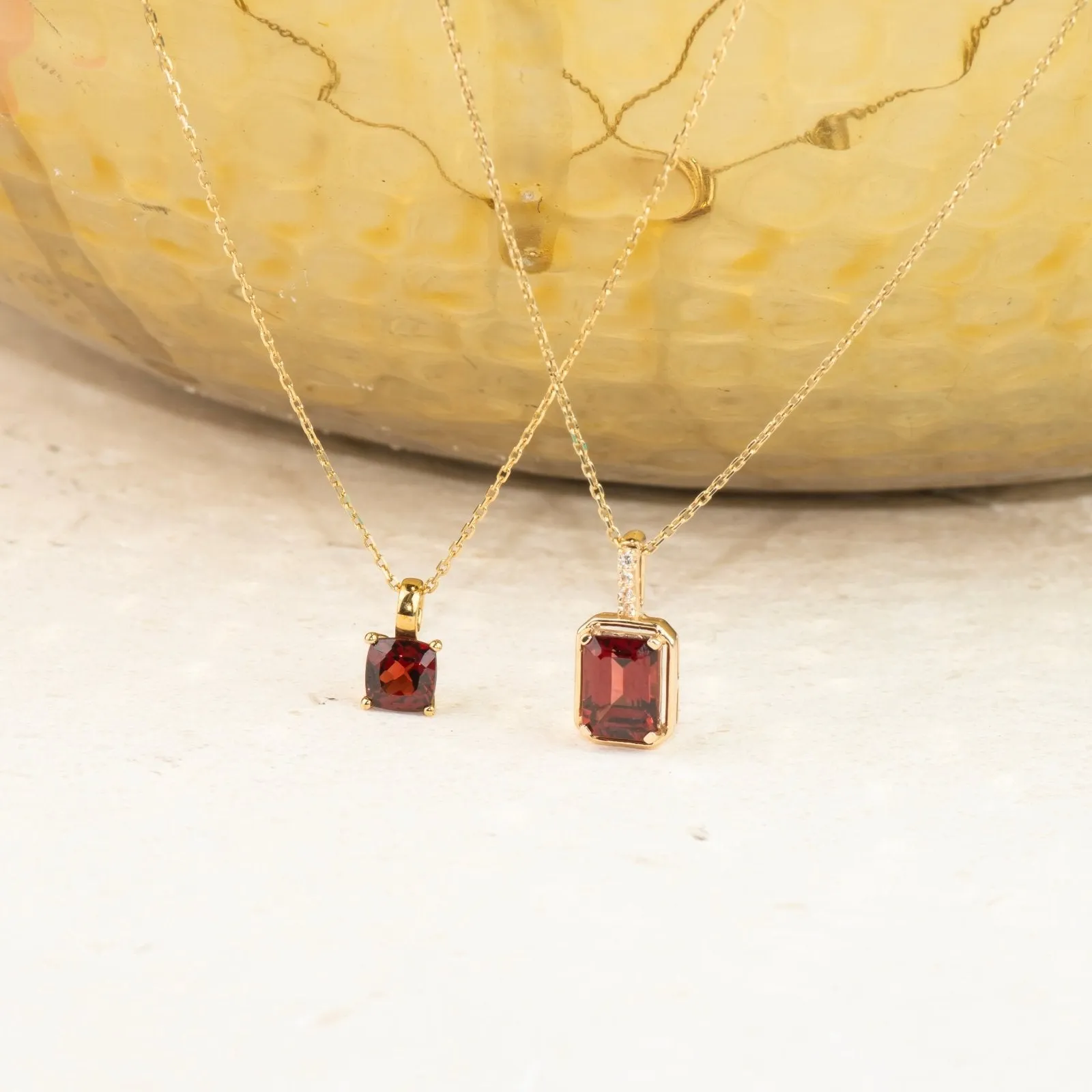 Bezel Set Emerald Cut Garnet Pendant with White Sapphire Bail