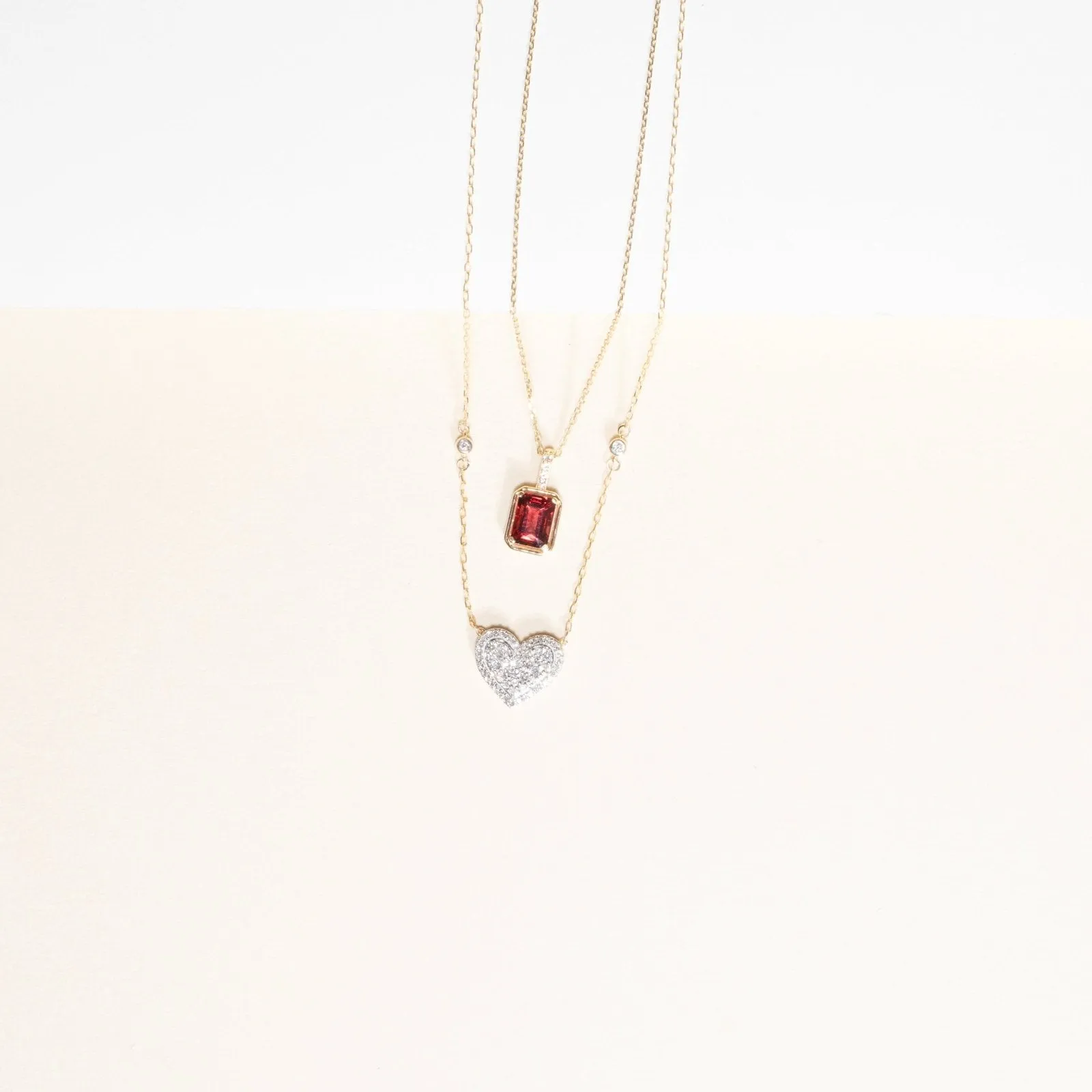 Bezel Set Emerald Cut Garnet Pendant with White Sapphire Bail