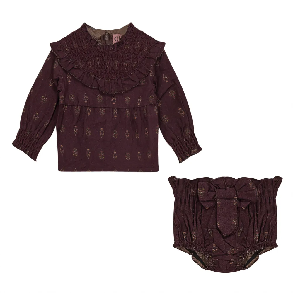 Burgundy embroidered yoke neckline baby girl outfit.