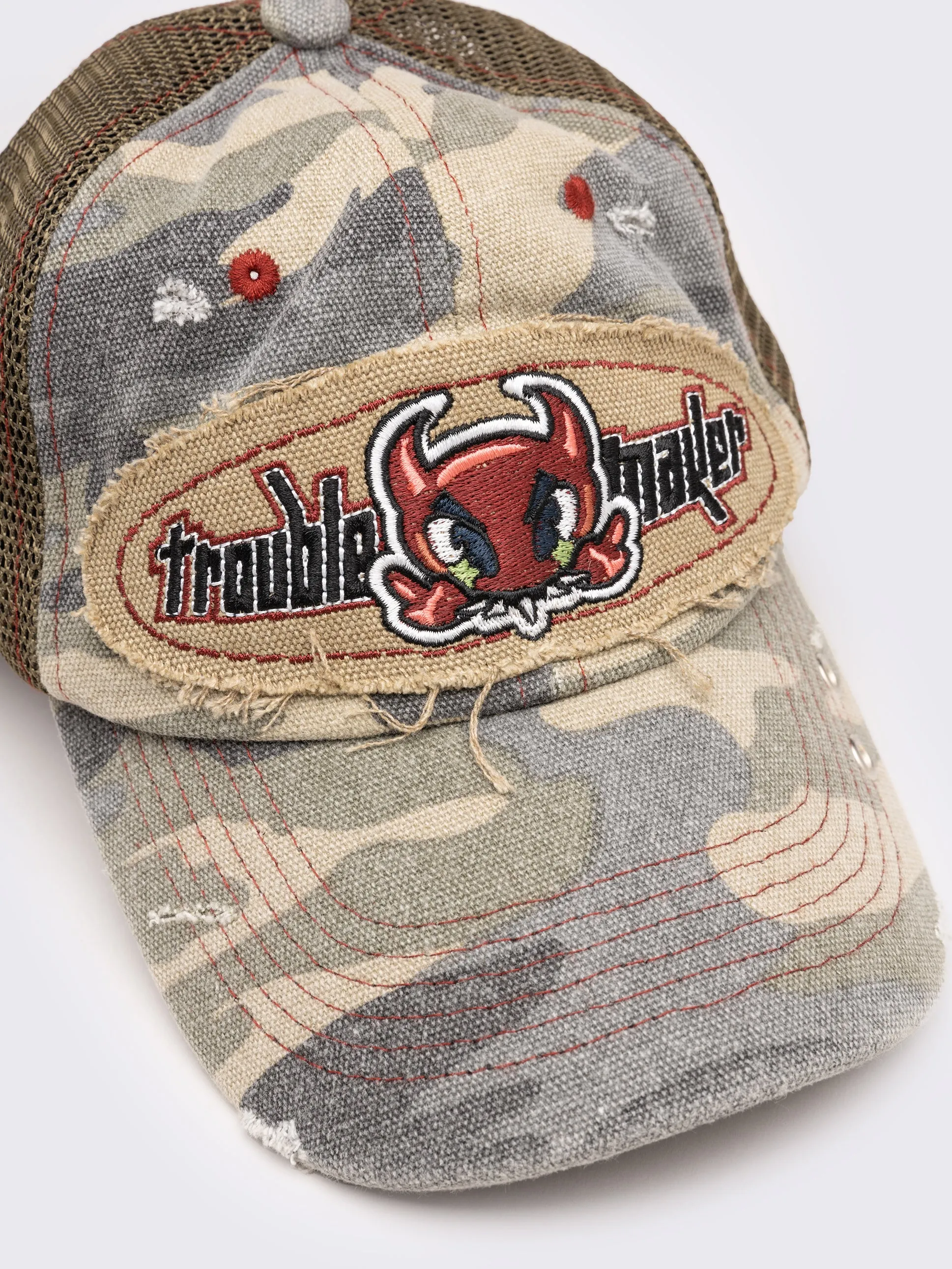 Distressed Camouflage Trucker Hat