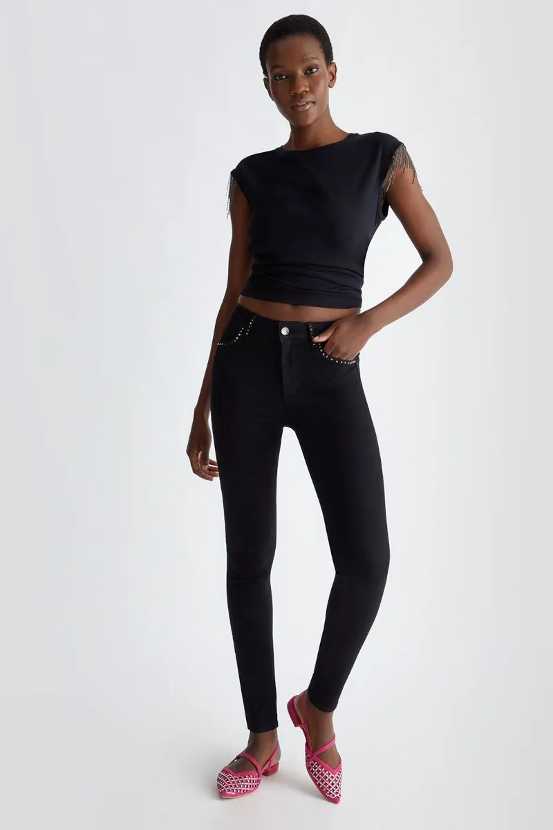 High-waisted women's black skinny jeans