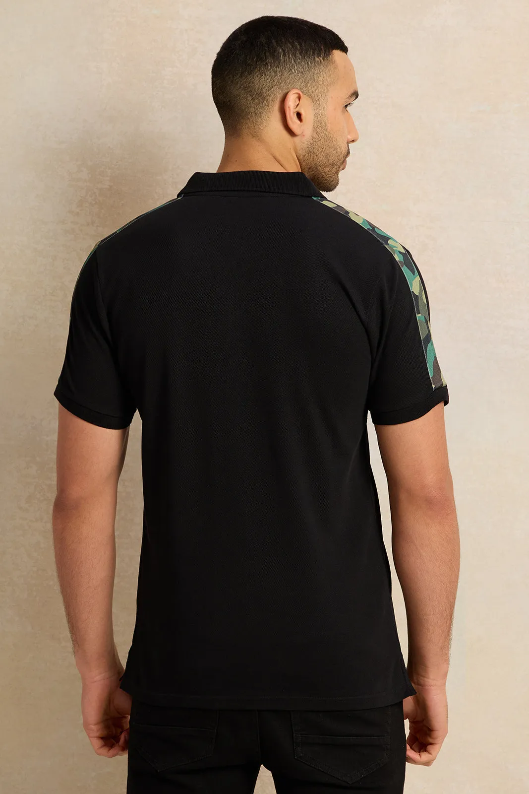 Men Black Solid Polo Shirt