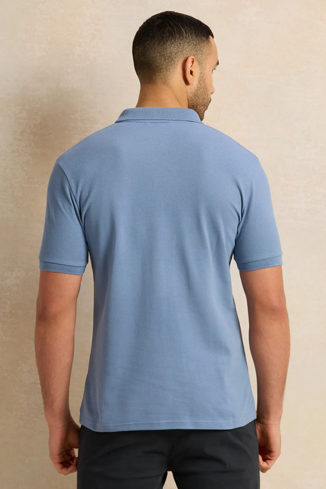 Men Blue Solid Pique Polo Shirt